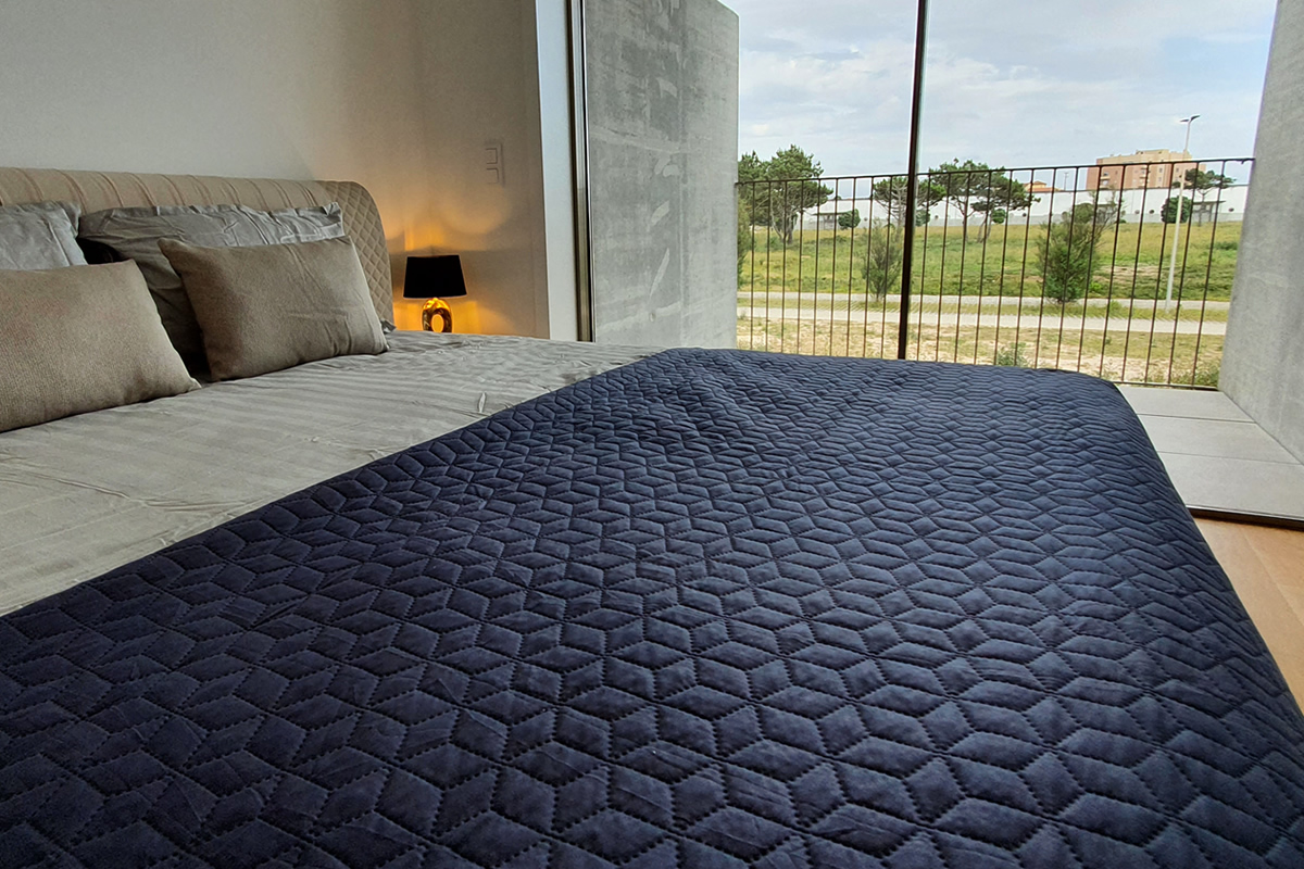 Master bedroom with kingsize bed, ensuite bathroom, private terrace and TV.